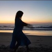 Ella on the Beach Tai Chi Stance